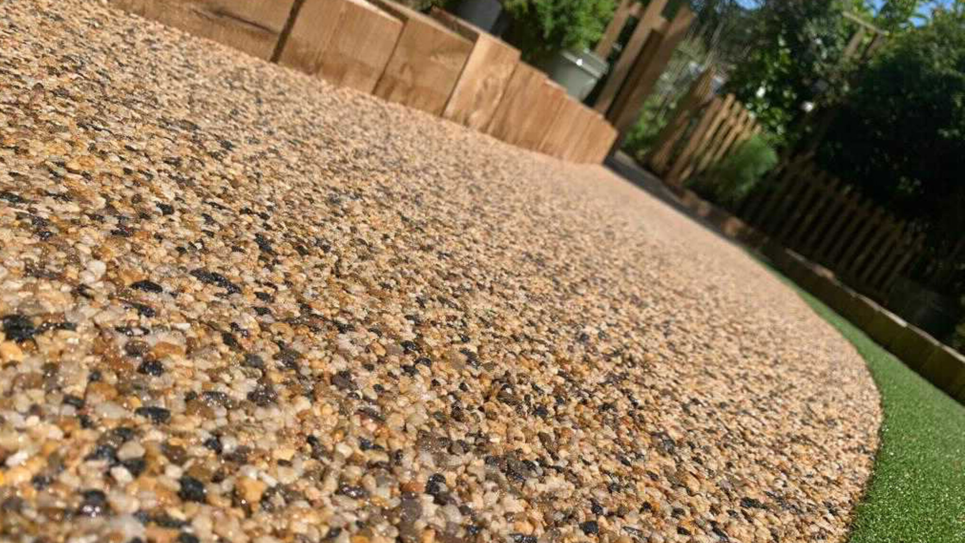 Our resin bound systems are fully permeable, low-maintenance, and visually striking—ideal for driveways, pathways, patios, and commercial areas. Available in a wide variety of colours and finishes, resin bound surfacing offers long-lasting performance with a smooth, seamless look.
